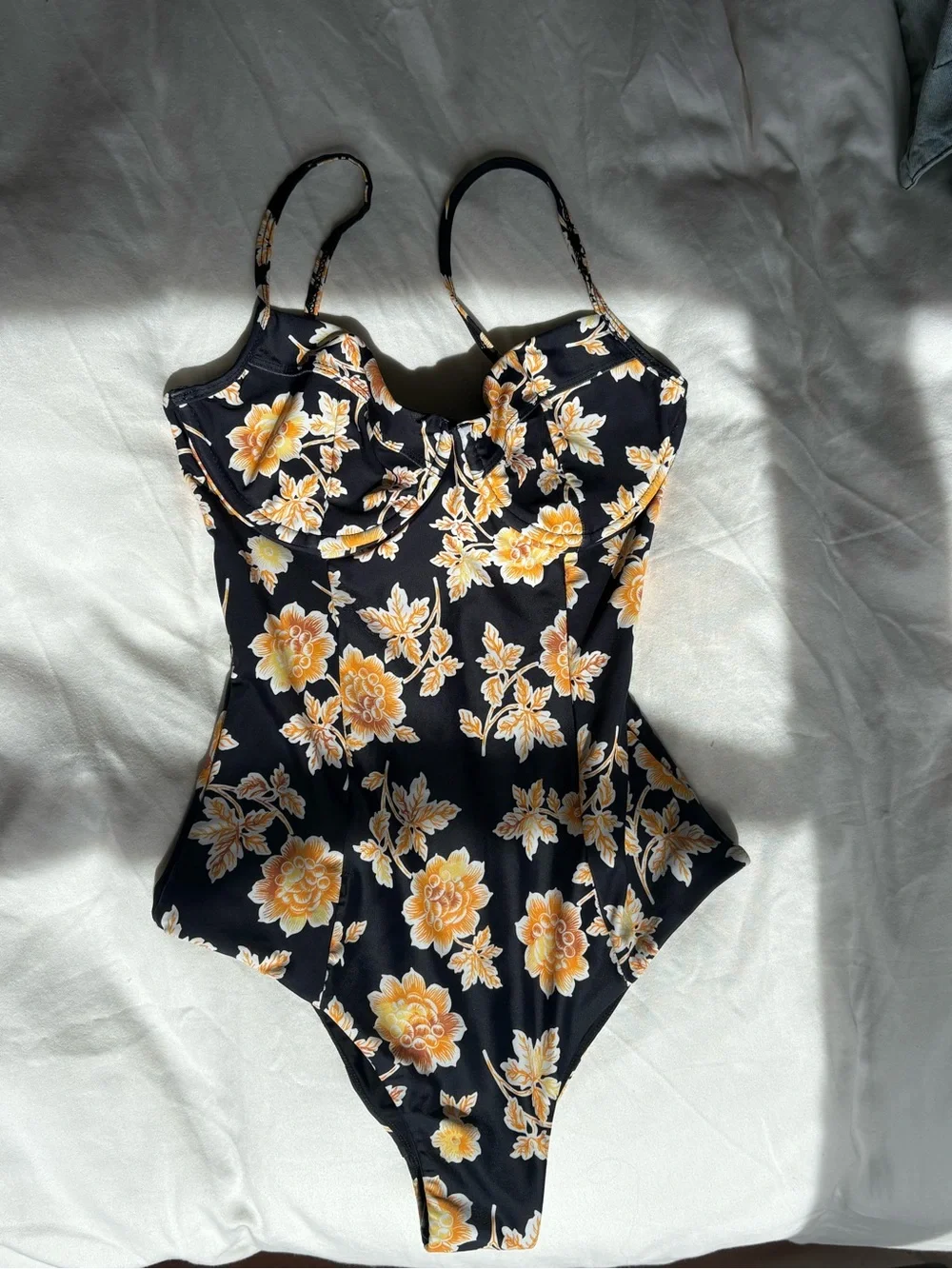 Auguste The Label Black One-Piece Bodysuit with Yellow Floral Print